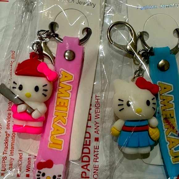 Hello Kitty Accessories - Hello Kitty - pink & blue set of (2) keychains